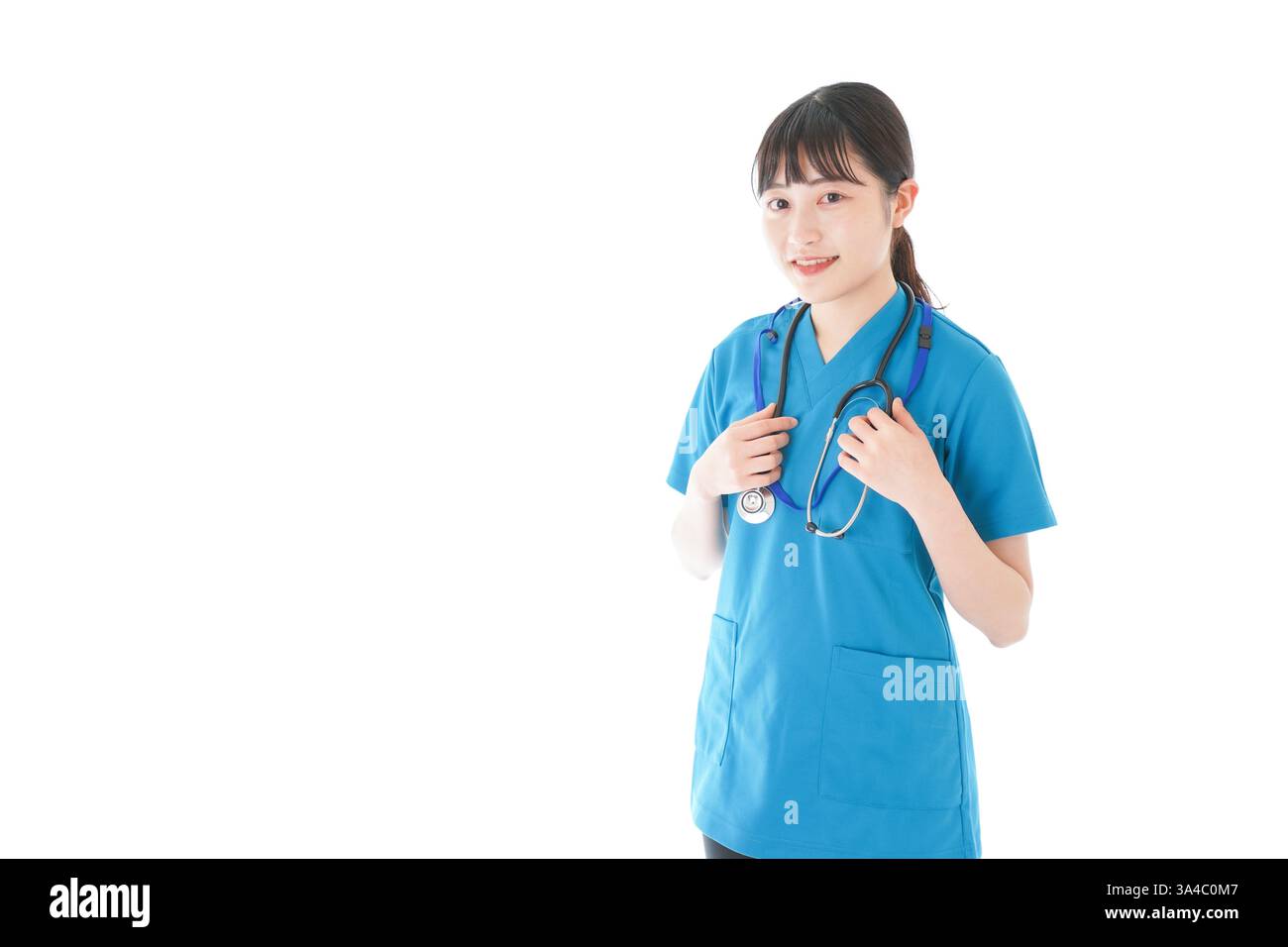 Lächelnde junge Krankenschwester Stockfoto