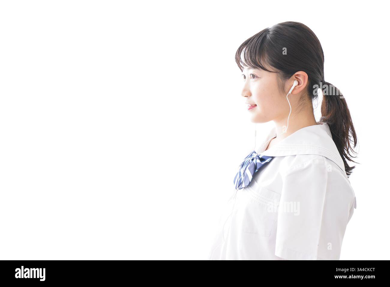 Schüler hören Musik Stockfoto