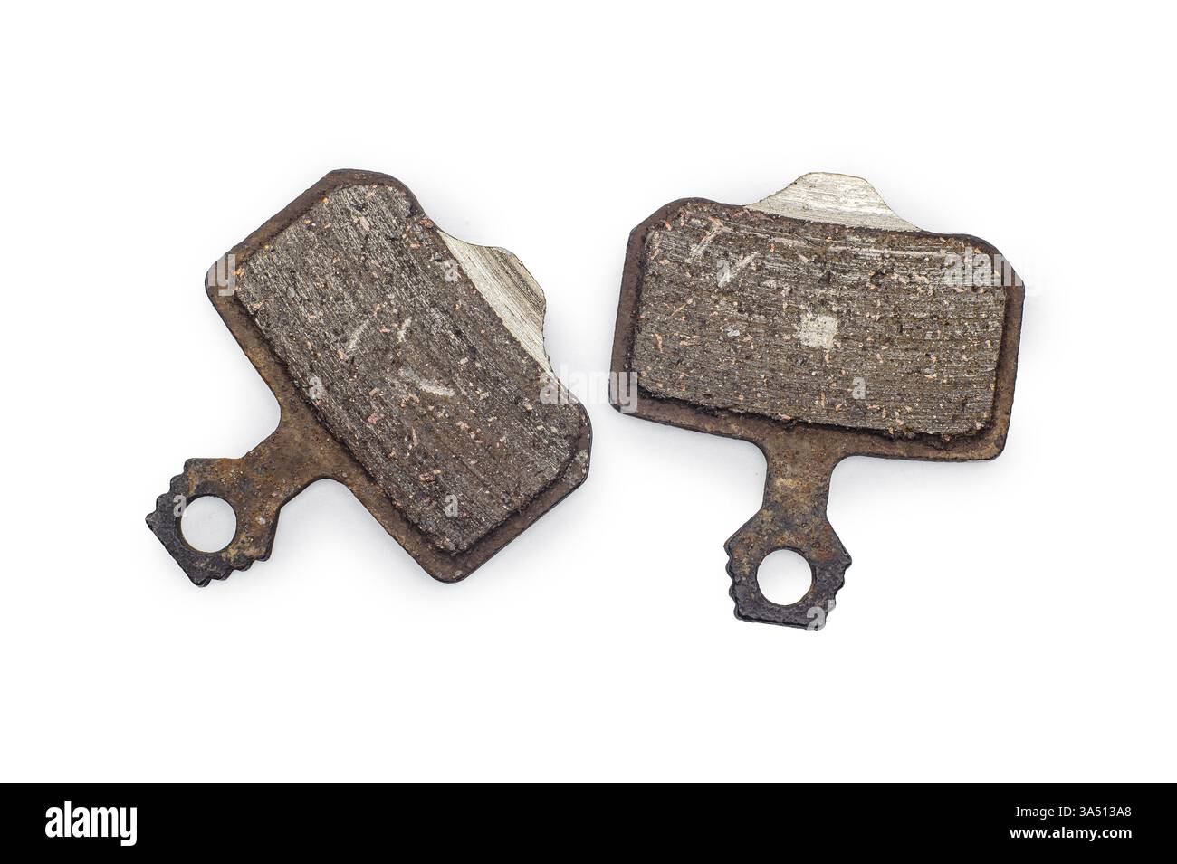 Abgenutzte Fahrradbremsbeläge auf weißem Hintergrund Makro Stockfoto