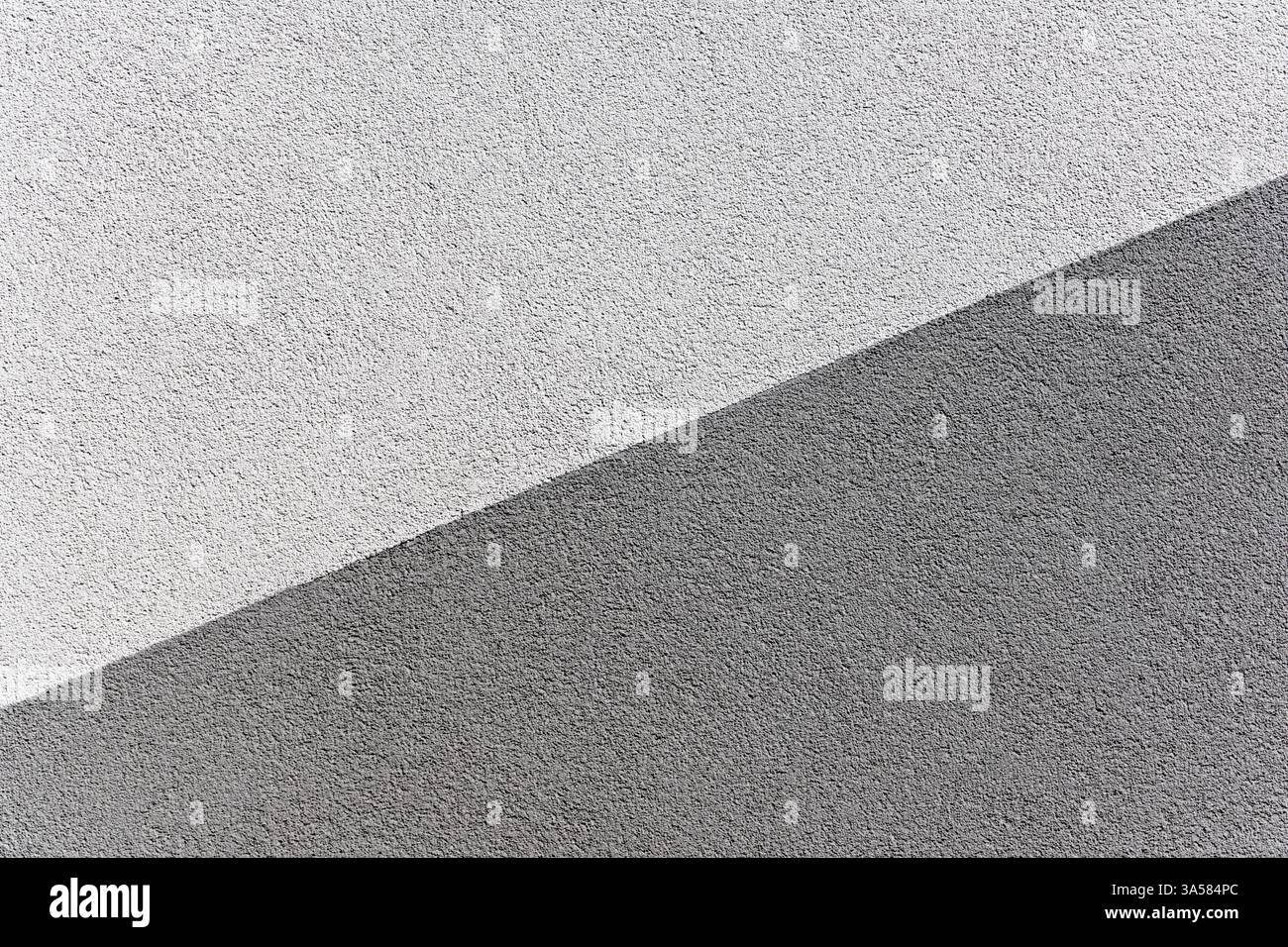 Abstrakter grauer Hintergrund. Detaillierte Textur der Wand. Kopierbereich für die Platzierung von Text für Konstrukteure. Stockfoto