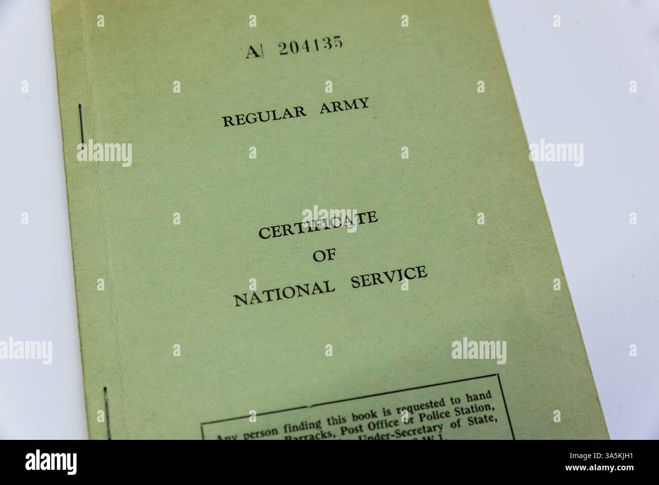 Reguläres Army Certificate of National Service Book. Rekordheft des British Army National Service aus den 1950er Jahren Stockfoto
