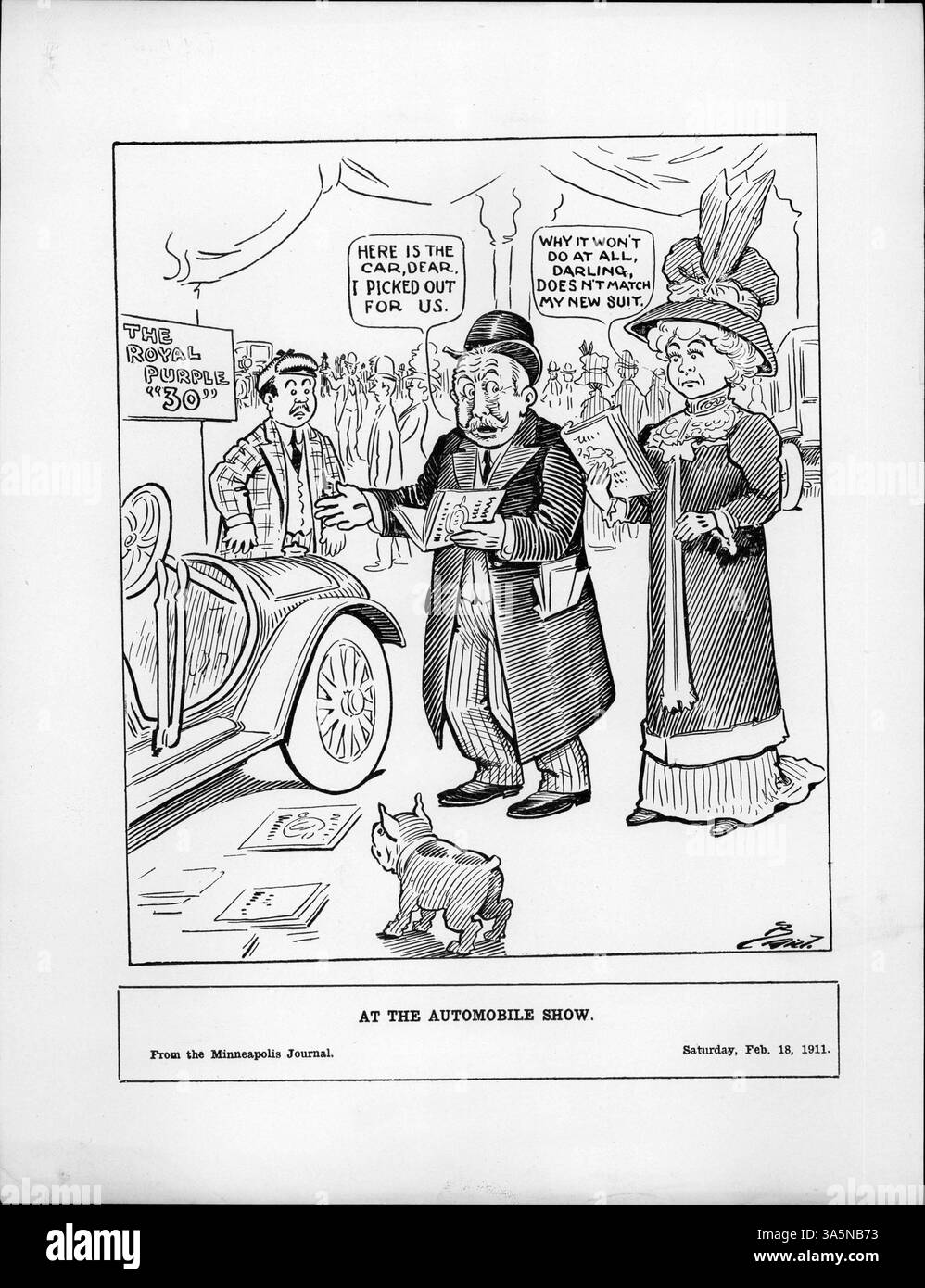 Auf der Automobile Show im Februar 1928 debattiert ein Paar über die Eignung des Wagens aufgrund seiner Übereinstimmung mit einem neuen Anzug. Die Veranstaltung, die in Minneapolis stattfand, zeigte verschiedene Automobilhersteller und wurde von der lokalen Presse berichtet. Stockfoto