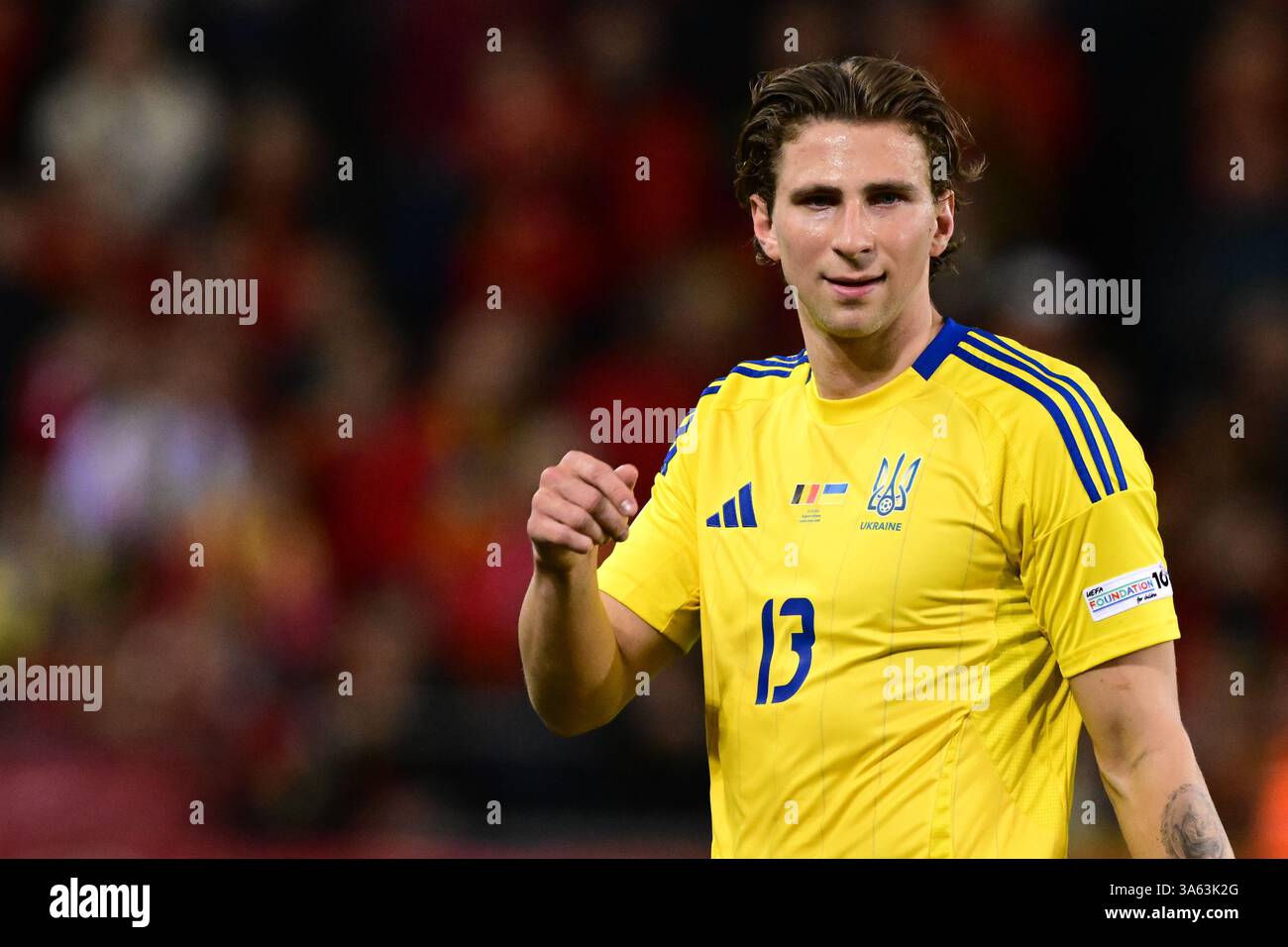 GENK - Illia Zabarnyi aus der Ukraine während des Playoff-Spiels der UEFA Nations League zwischen Belgien und der Ukraine in der Cegeka Arena am 23. März 2025 in Genk, Belgien. ANP | Hollandse Hoogte | GERRIT VAN KEULEN Stockfoto