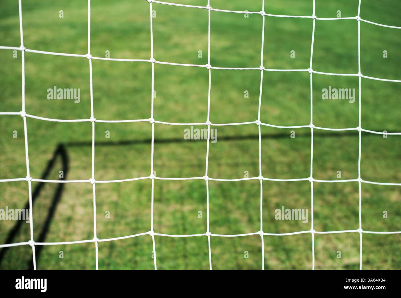 Fußball Netto und grasgrün Hintergrund Stockfoto