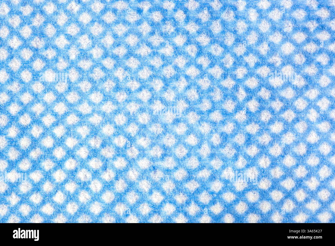 J Reinigungsblau und weißes Küchentuch Hintergrund. Haushaltsreinigungsproduktkonzept. Stockfoto