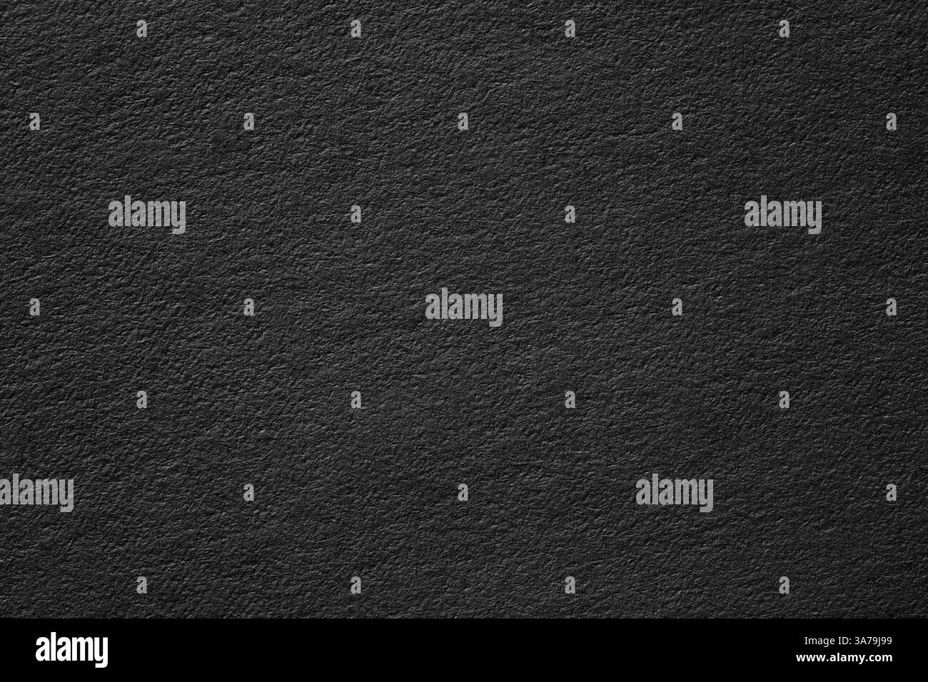 Abstrakte Textur des schwarzen Posters. Dunkler Papierhintergrund mit Vignette Stockfoto