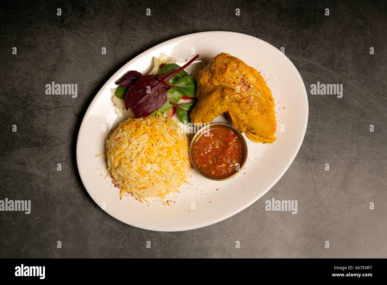 Chicken Mandi: Im Familienrestaurant im Yemen Heaven in 98 Walmgate in York, North Yorkshire. Jemen Heaven ist ein Restaurant aus dem Nahen Osten. Stockfoto