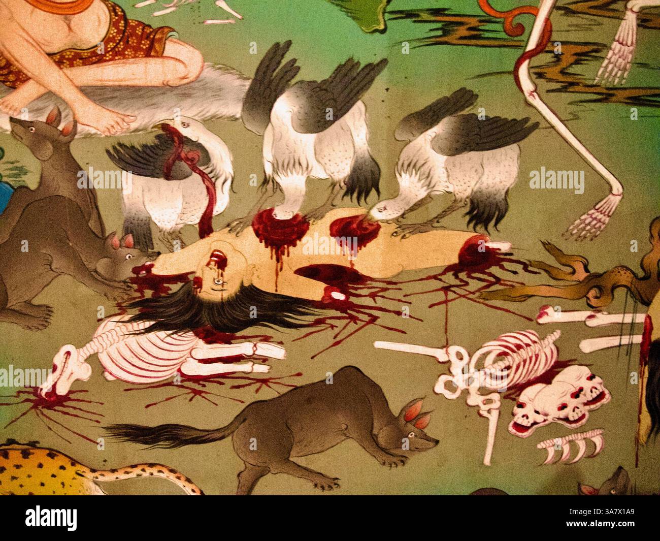 Grafische tibetische Malerei im Kloster Jamchen Lhakhang zeigt Geier und Bestien, die eine Leiche in einer symbolischen Himmelsbegräbnisszene verzehren. Stockfoto