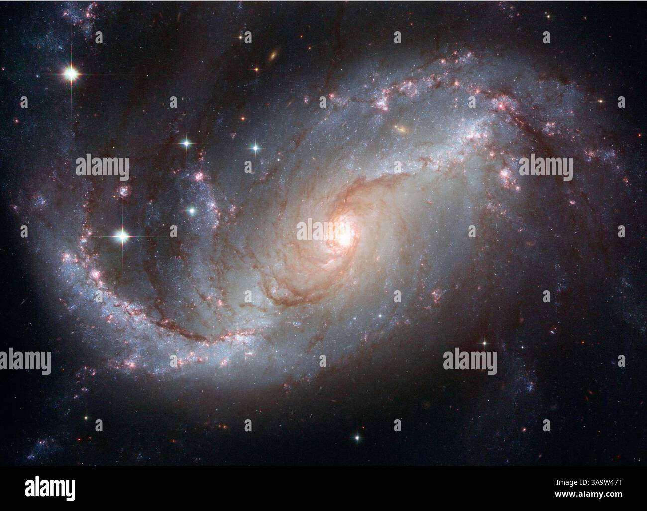 3. April 2007 - Barred Spiral , Weltraum - Hubbles Ansicht einer Gitterspirale NGC 1672 enthüllt Details in den sternbildenden Wolken und dunklen Banden interstellaren Staubs der Galaxie. (Foto: © NASA/ZUMA Press) Stockfoto