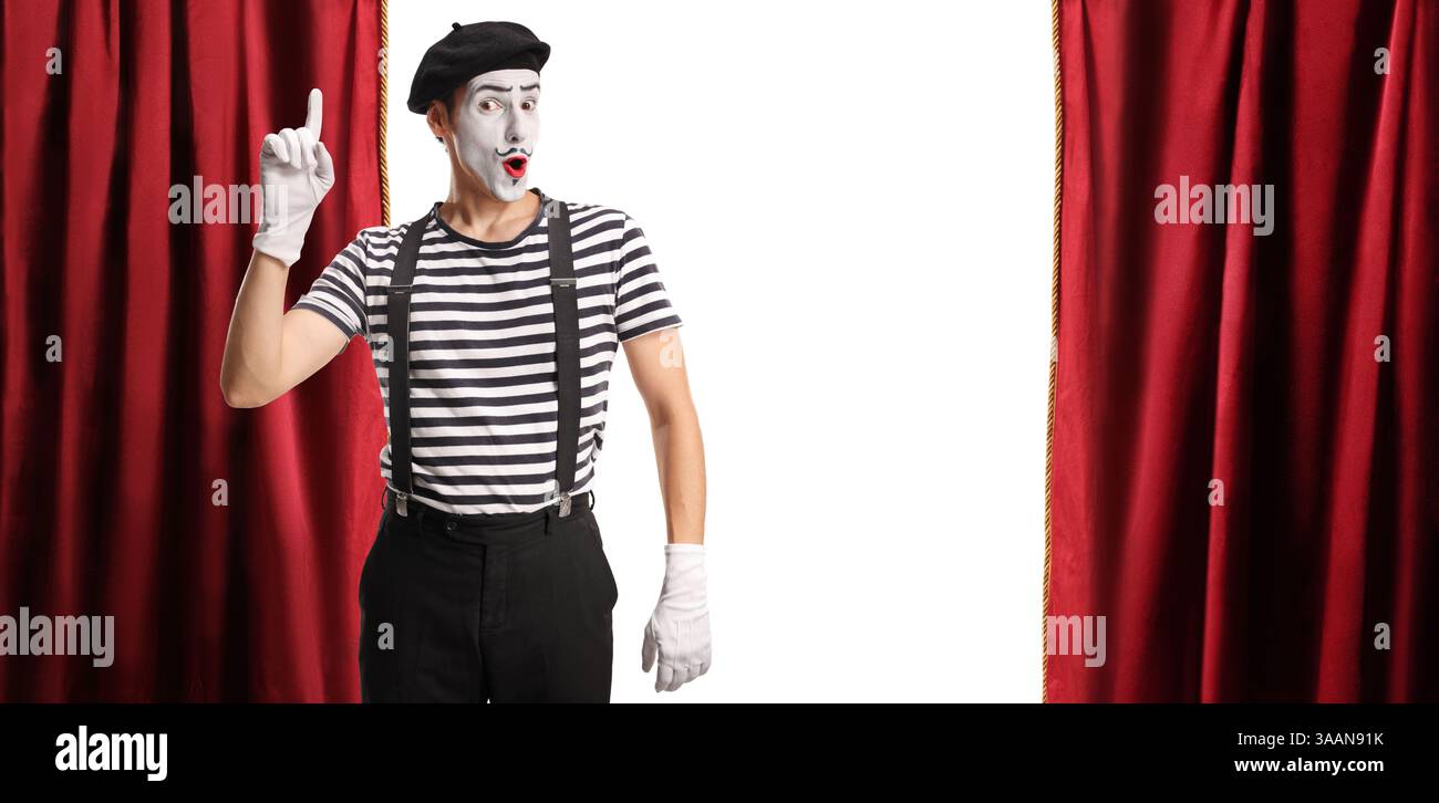 MIME zeigt auf der Bühne mit roten Vorhängen Stockfoto