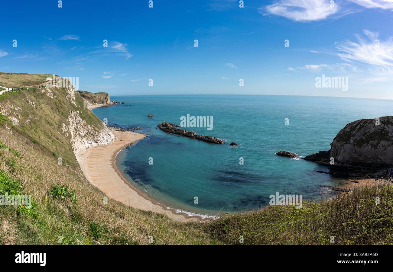 Zwischen den berühmteren Lulworth Cove und Durdle Door liegt St. Oswald's Bay. Stockfoto