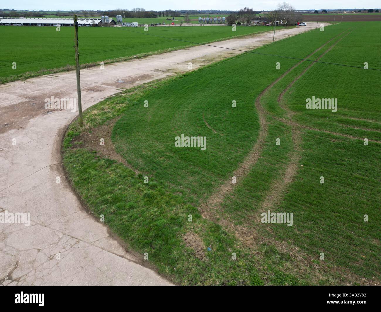 Luftaufnahme des Militärflugplatzes 2. Weltkrieg. Forma militärische Bomberstation RAF Catfoss, East Yorkshire Stockfoto Luftaufnahme des Militärflugplatzes 2. Weltkrieg. Forma militärische Bomberstation RAF Catfoss, East Yorkshire Stockfoto