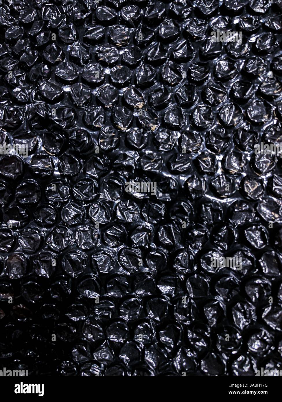 Hintergrund mit Luftpolsterfolie oder Kunststoffpolstermuster - Smartphone-aufgenommenes Stockfoto