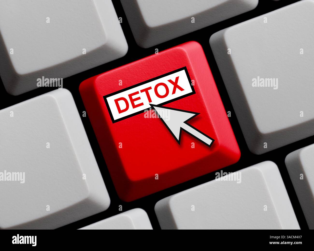 Farbige Taste auf einer Computertastatur mit Mauspfeil zeigt Detox Stockfoto