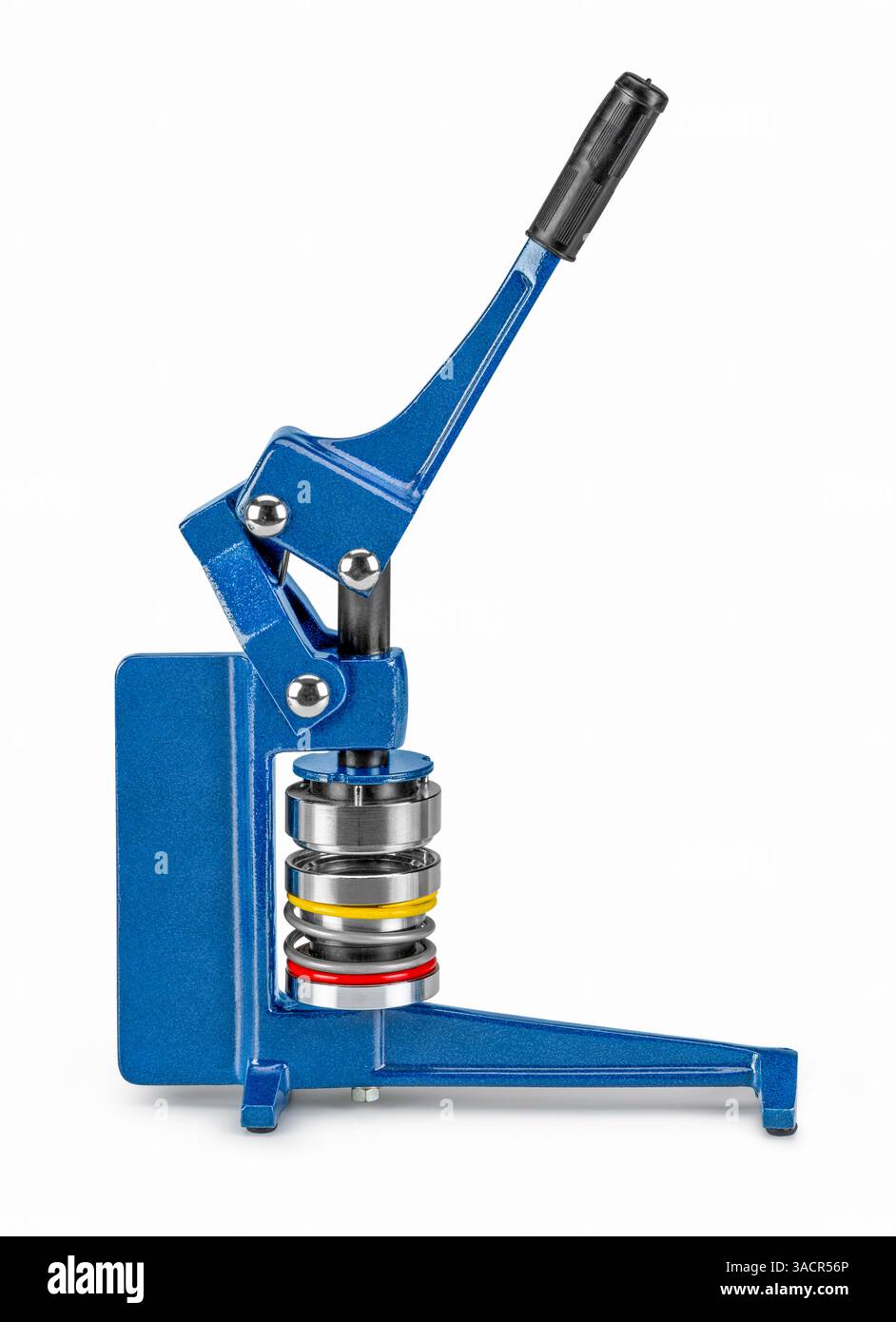 Seitliche Aufnahme einer Maschine mit blauem Knopf auf weißem Rücken mit Schatten Stockfoto