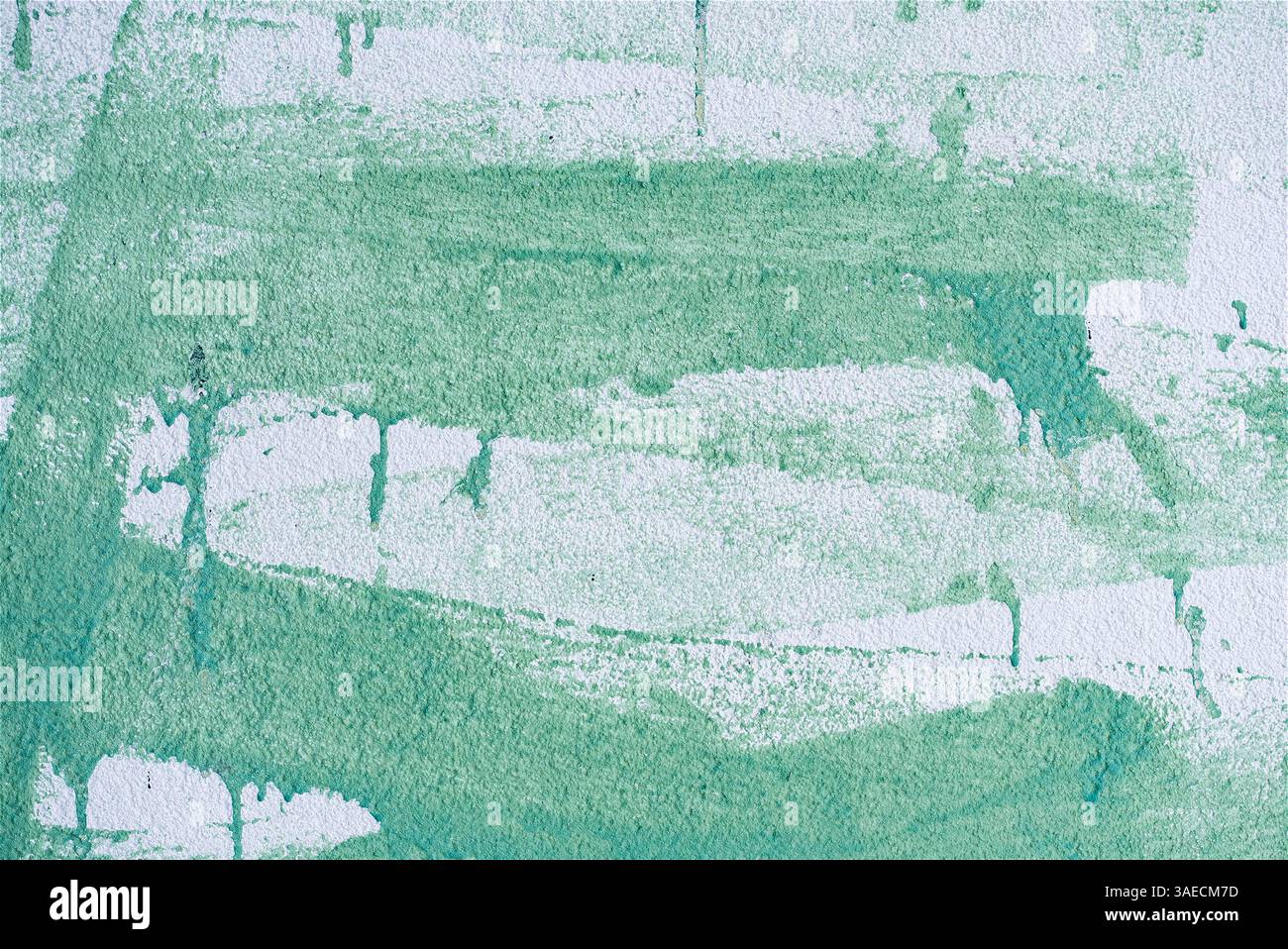 Eine weiße Wand mit grüner Farbe. Hochwertige Fotos Stockfoto