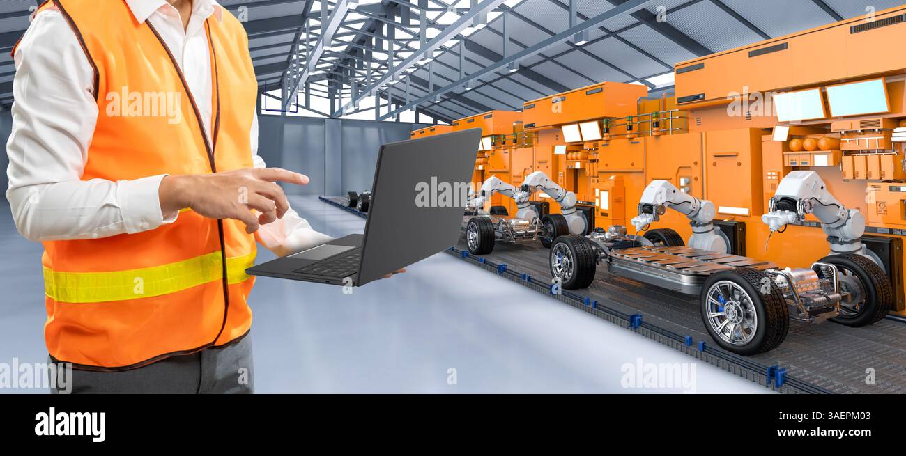 Asiatischer Ingenieur oder Techniker arbeiten mit EVV Automatisations-Automobilfabrik Stockfoto