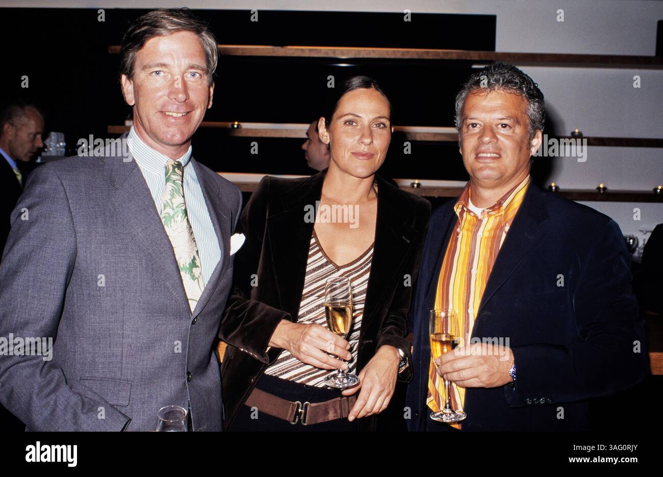 Johann Graf Villavicencio-Margheri, Bettina Bach und Michael Rosenblat, Vorstandschef und Gesellschafter des Modeunternehmens Tom Tailor, bei einer Veranstaltung, um 1997. Stockfoto