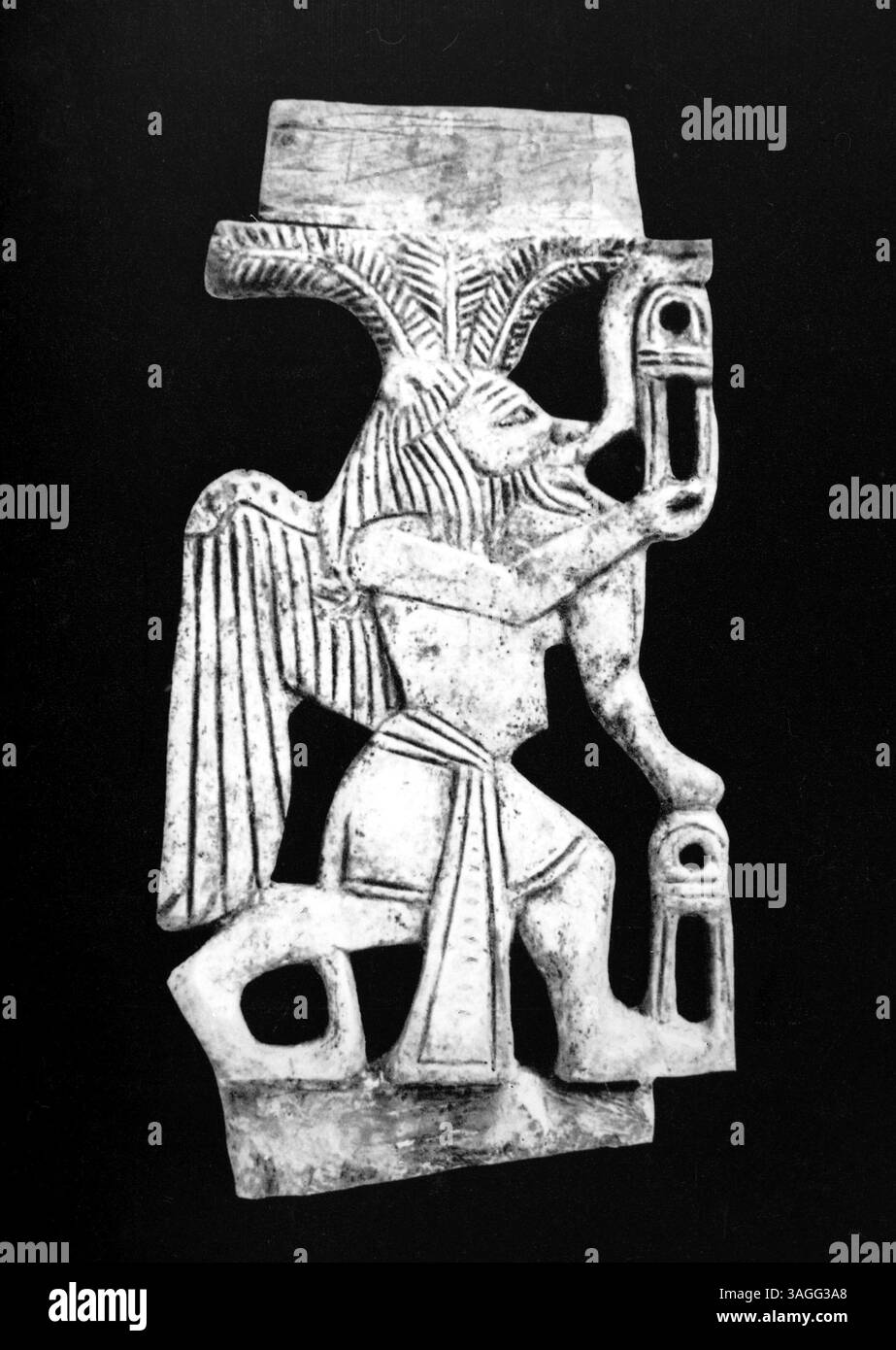 Ägyptischer Gott Bes, alte Elfenbeinschnitzerei Stockfoto