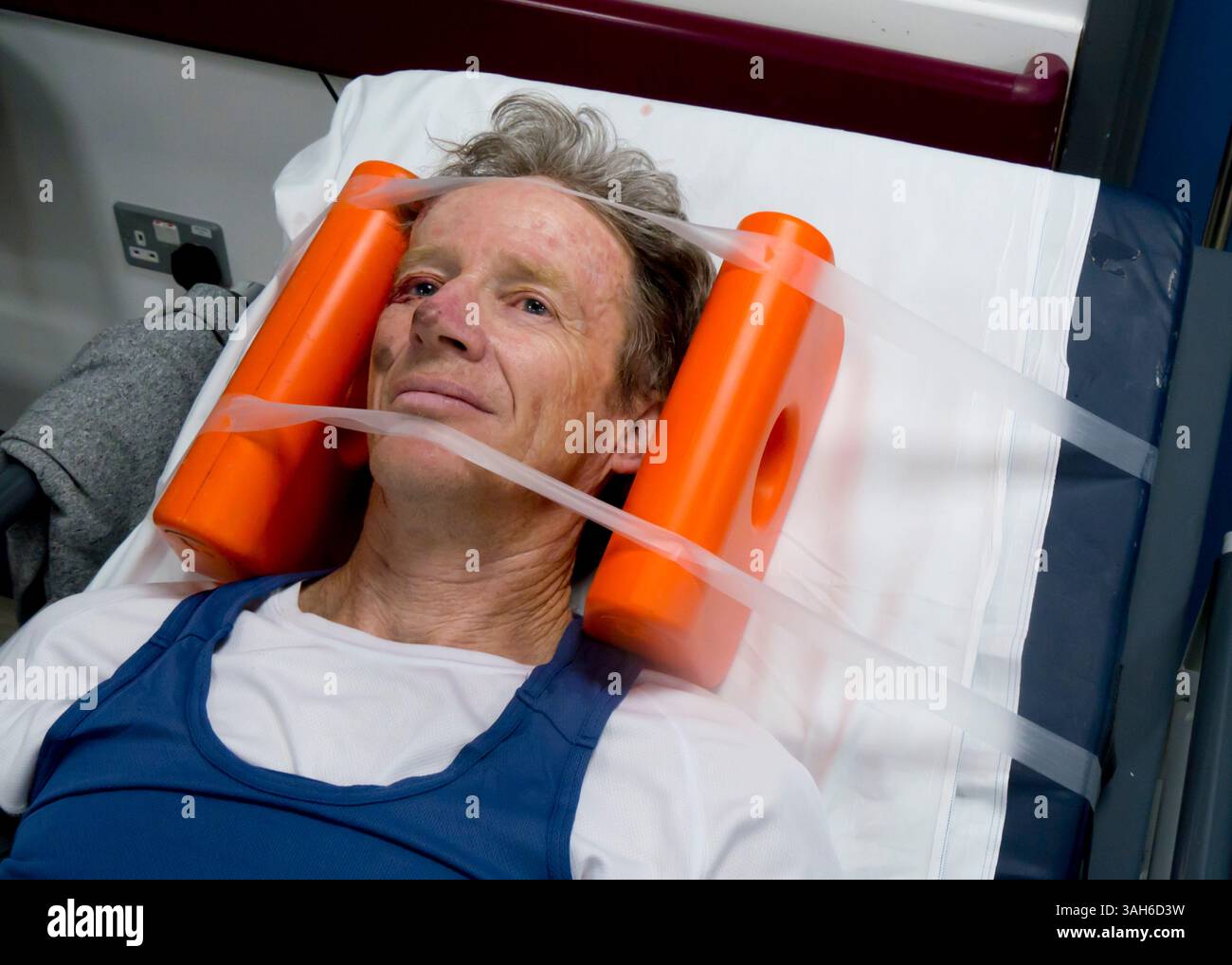 Traumaverletzte Fahrradunfall-orange Pads Stockfoto