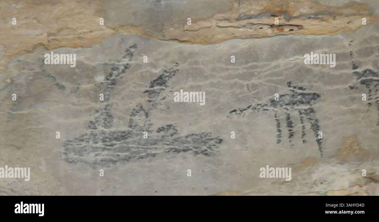 Diese Zeichnung eines Forscherteams aus der Andriamamelo-Höhle im Westen Madagaskars zeigt einen Faultier-Lemur mit einem Menschen und zwei Jagdhunden. Das Kunstwerk stellt einen Einblick in prähistorische Jagdpraktiken dar. Stockfoto