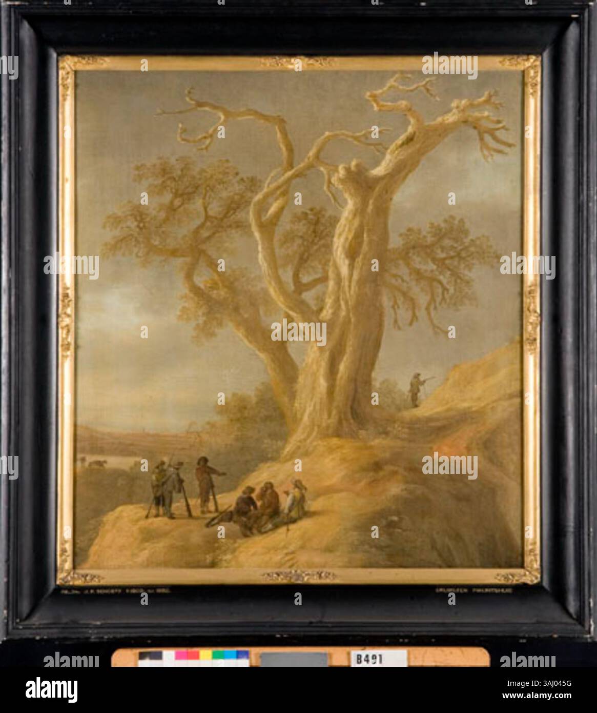 „Landschaft mit Soldaten in Ruhe“ von J.P. Schoeff, gemalt zwischen 1640 und 1659, zeigt Soldaten, die unter einer Eiche ruhen, in einer ruhigen niederländischen Landschaft. Dieses Öl auf Leinwand fängt die Ruhe des militärischen Lebens im 17. Jahrhundert ein. Stockfoto