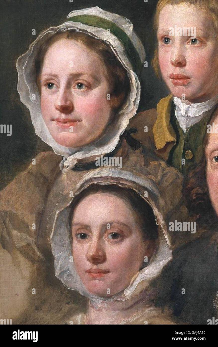 William Hogarths Gemälde „Heads of Six of Hogarth’s Servants“ (Mitte der 1750er Jahre) zeigt sechs Figuren von Hogarths Dienstboten, die eine besondere Rundohr-Kappe tragen und die englische Porträtmalerei und soziale Klasse des 18. Jahrhunderts betonen. Stockfoto