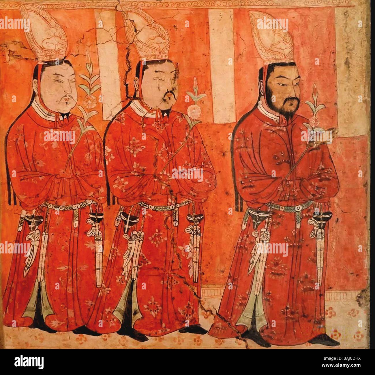 Die Darstellung uigurischer Fürsten in chinesischen Gewändern und Kopfbedeckungen aus dem 9. Bis 12. Jahrhundert, wie sie in der Bezeklik-Höhle 9 zu sehen sind. Dieses Kunstwerk repräsentiert die kulturelle Integration der uigurischen Eliten mit chinesischem Einfluss während der Tang-Dynastie. Stockfoto