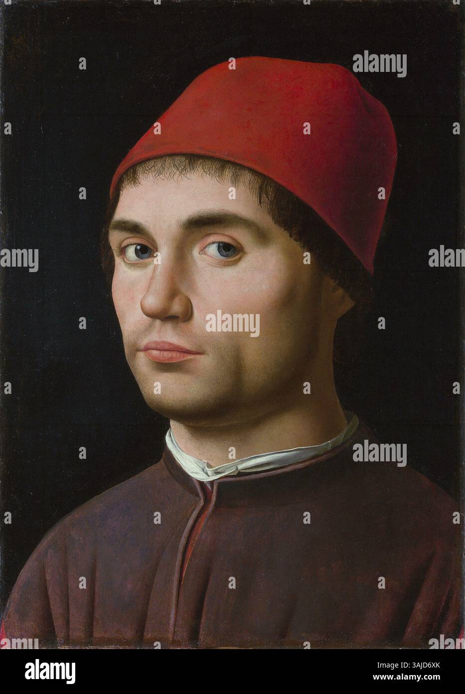 Dieses Porträt von Antonello da Messina von 1475 bis 1476 zeigt einen namenlosen Mann, der in Öl auf Pappelholz gemalt ist. Das Gemälde ist Teil der Sammlung der Nationalgalerie und zeigt italienische Renaissanceporträts. Stockfoto