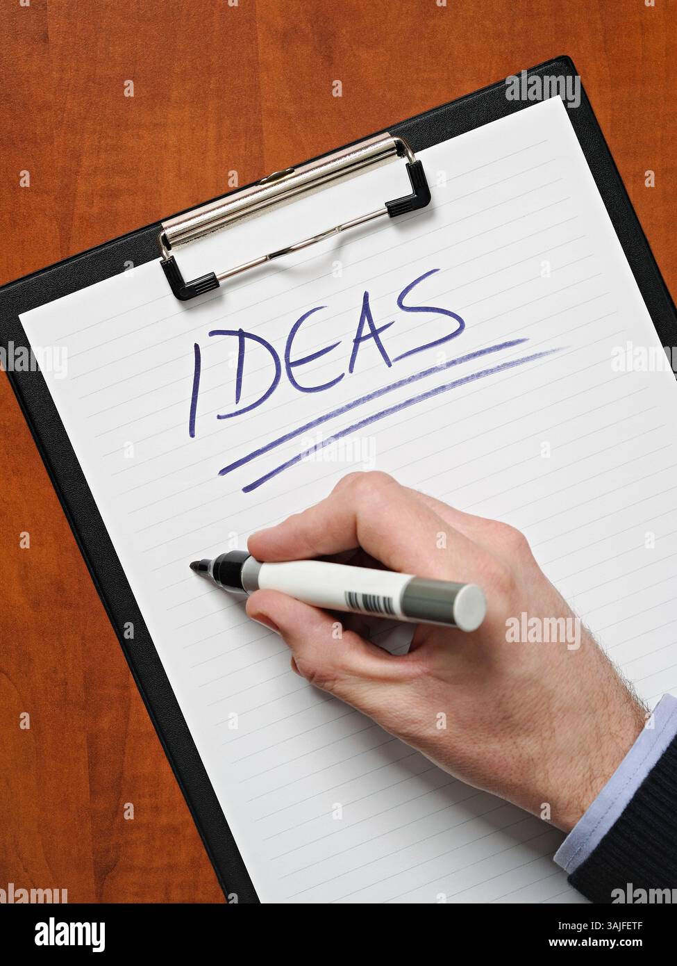 Schreiben von Ideen während eines Brainstormings Stockfoto