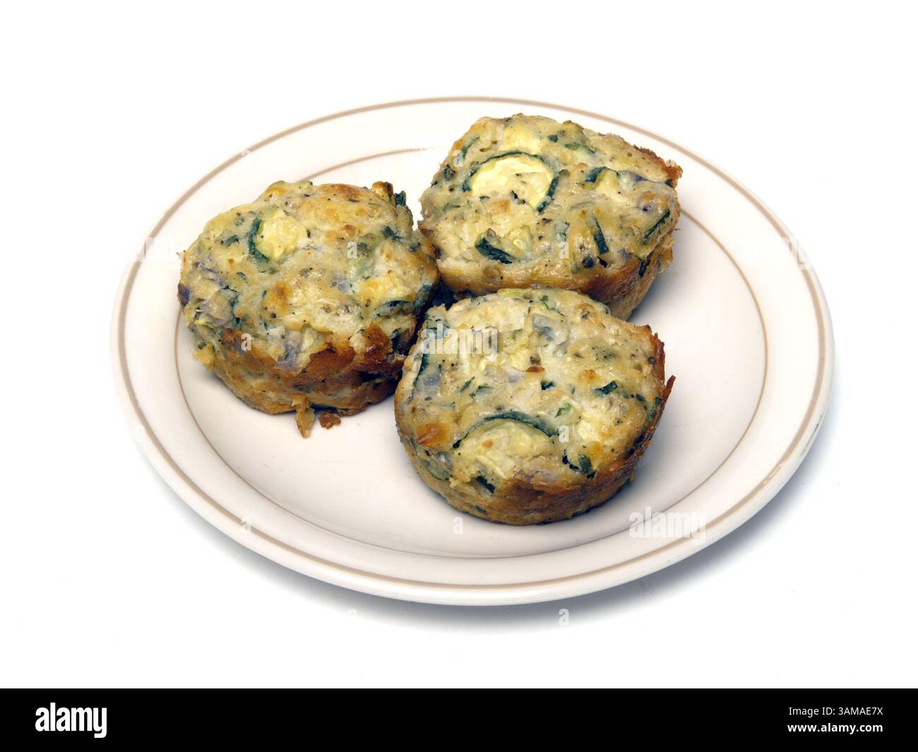 6. August 2007 - STEMPEL, USA - gewürfelte Zucchini werden in Muffindosen zu herzhaften Törtchen gebacken und nicht als traditioneller Kuchen. (Steve Kosko/Modesto Bee/MCT) (Bild: © Steve Kosko/mct/ZUMAPRESS.com) Stockfoto