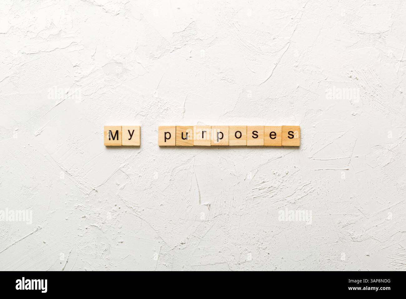 Meine Zwecke Wort auf Holzblock geschrieben. Meine Zwecke Text auf Zementtisch für Ihr Design, Konzept. Stockfoto
