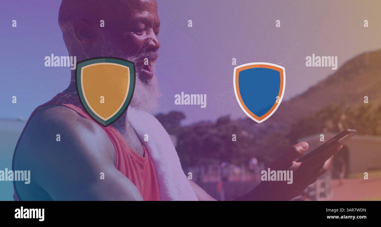 Zwei Logos stoßen mit Basketball über Smartphone gegen afroamerikaner auf Stockfoto