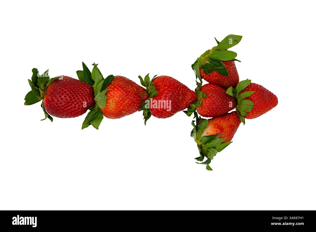 Erdbeeren Pfeil zeigt den Weg isoliert. Fun Mix Früchte und visuelle Metapher. Der süßeste Weg vorwärts, der Weg vom Bauernhof zum Tisch, die gesunde Richtung. Stockfoto