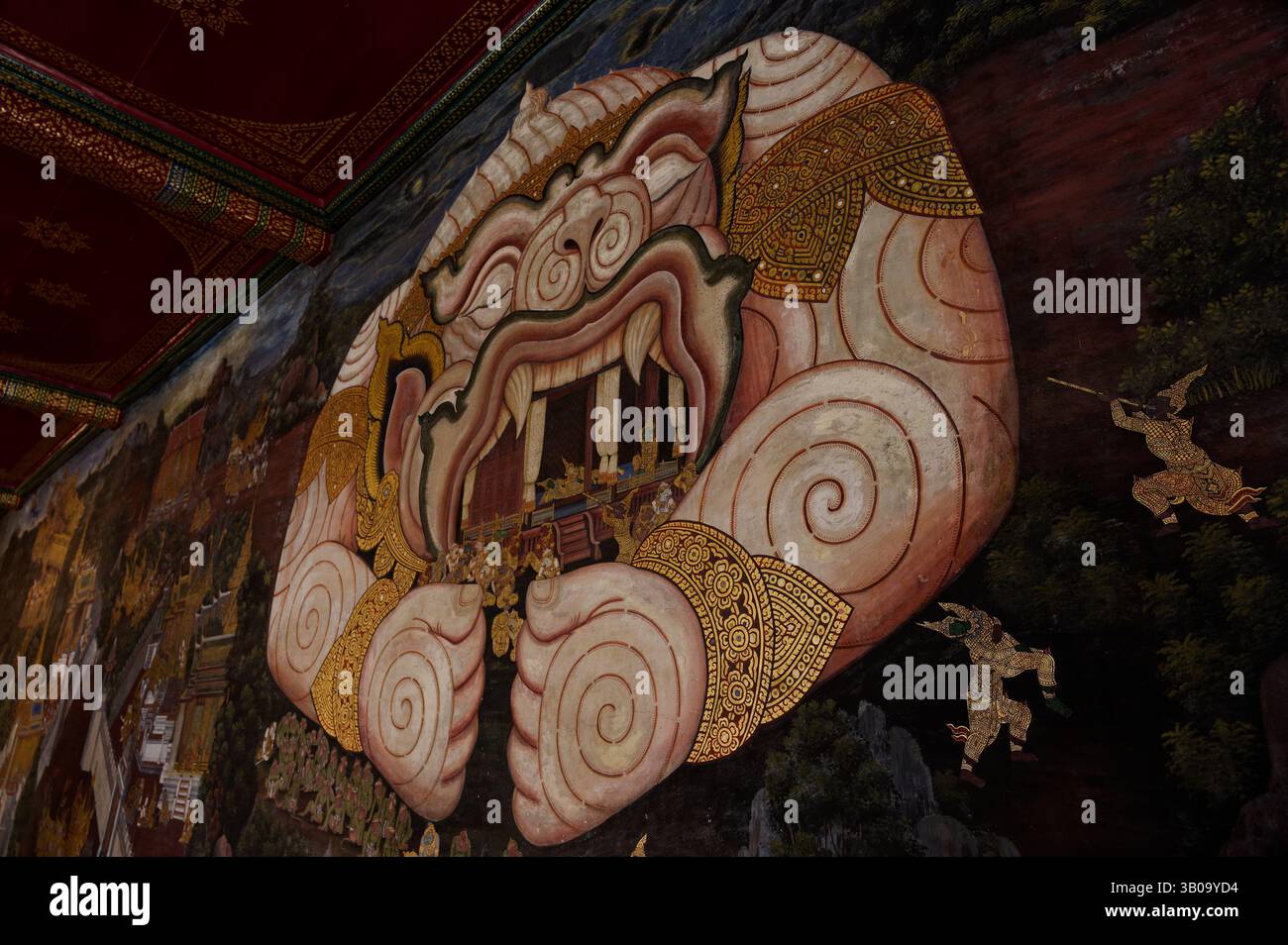 Das berühmte Ramayana-Wandbild im Wat Phra Kaew zeigt Hanuman in einer dramatischen Szene Stockfoto