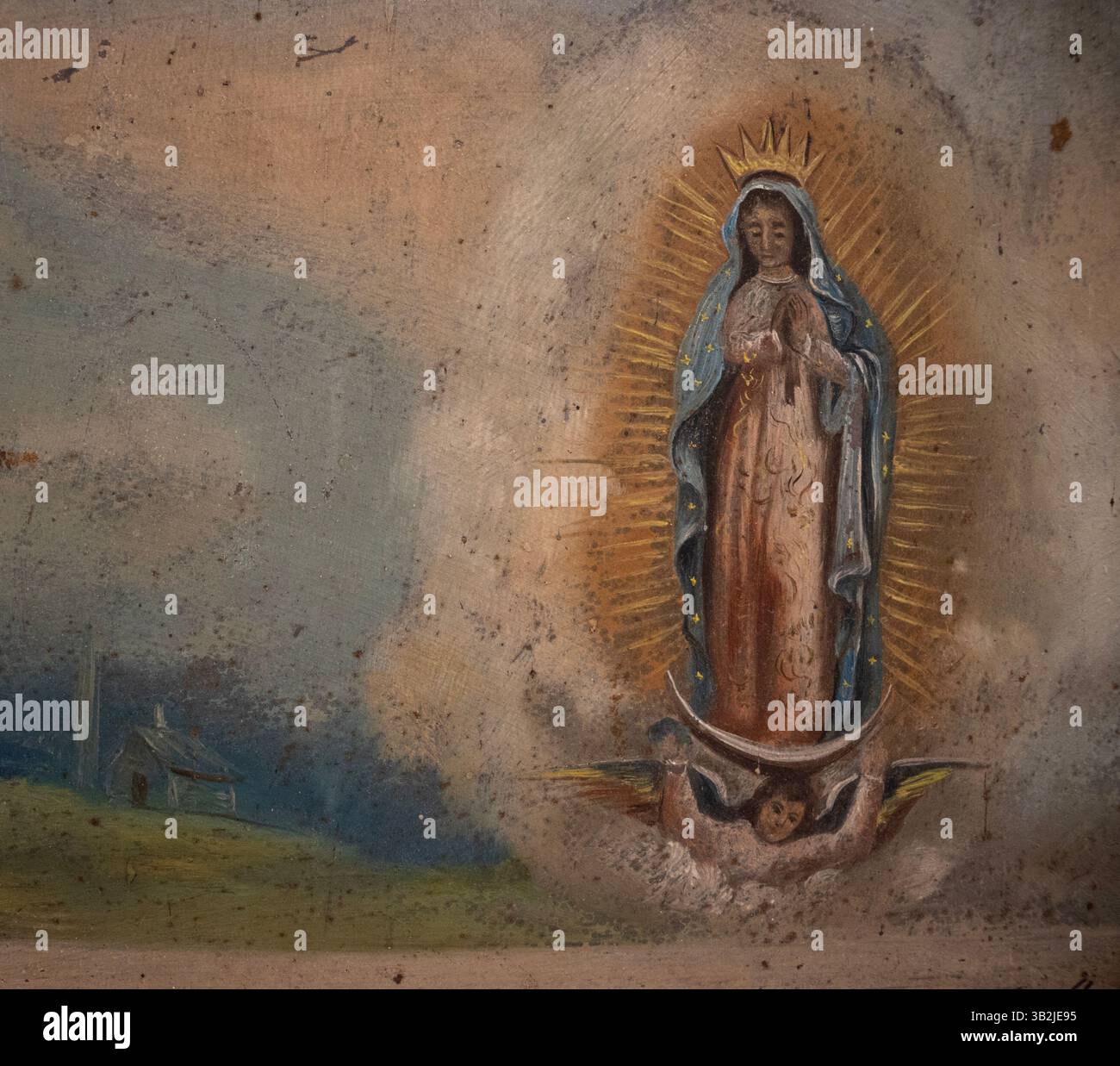 Detail eines mexikanischen Gemäldes unserer Lieben Frau von Guadalupe aus dem Jahr 1838 in einer mexikanischen und spanischen Ausstellung zur Devotionalkunst. Stockfoto