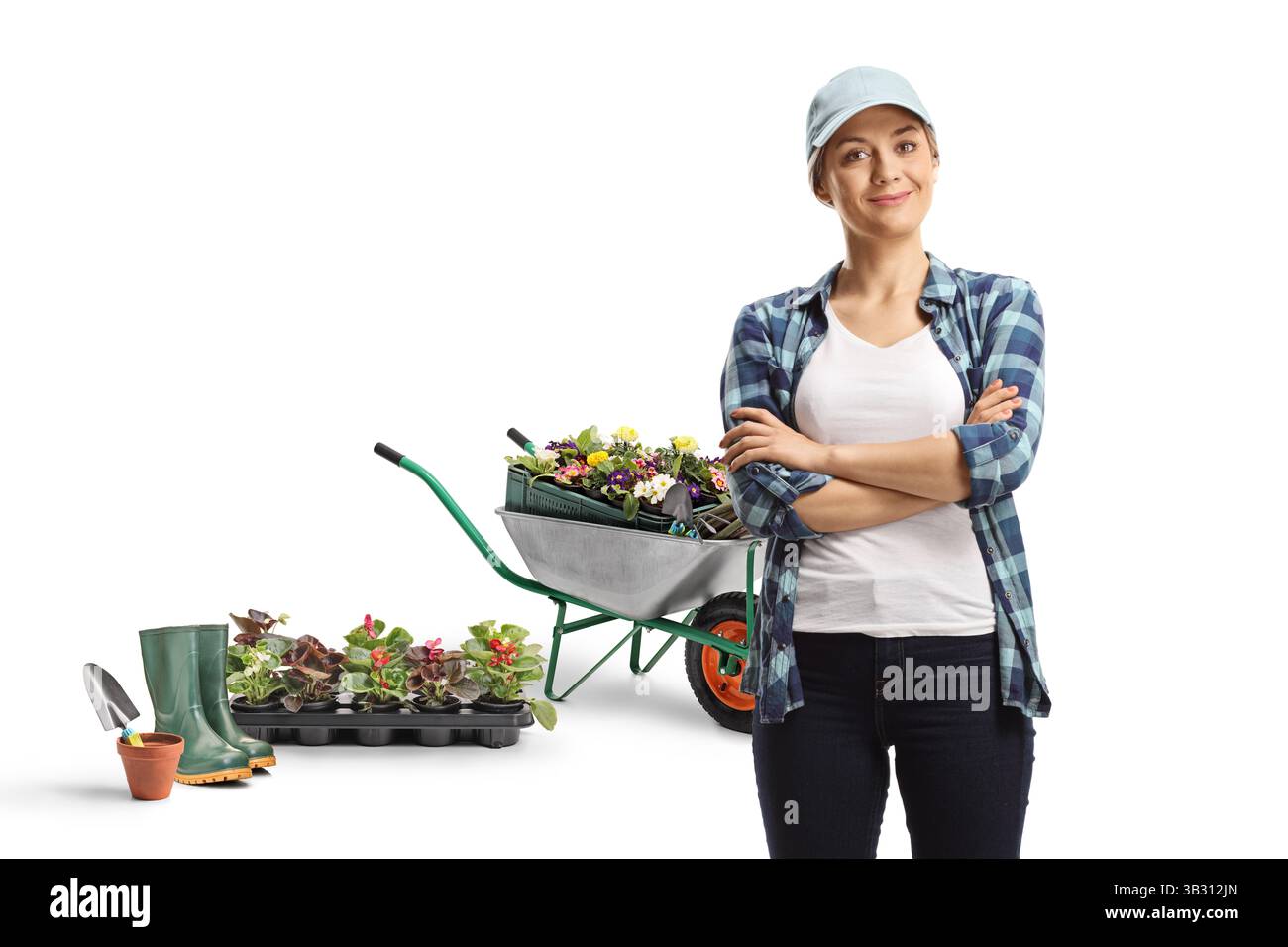 Frau posiert mit Gartengeräten isoliert auf weißem Hintergrund Stockfoto