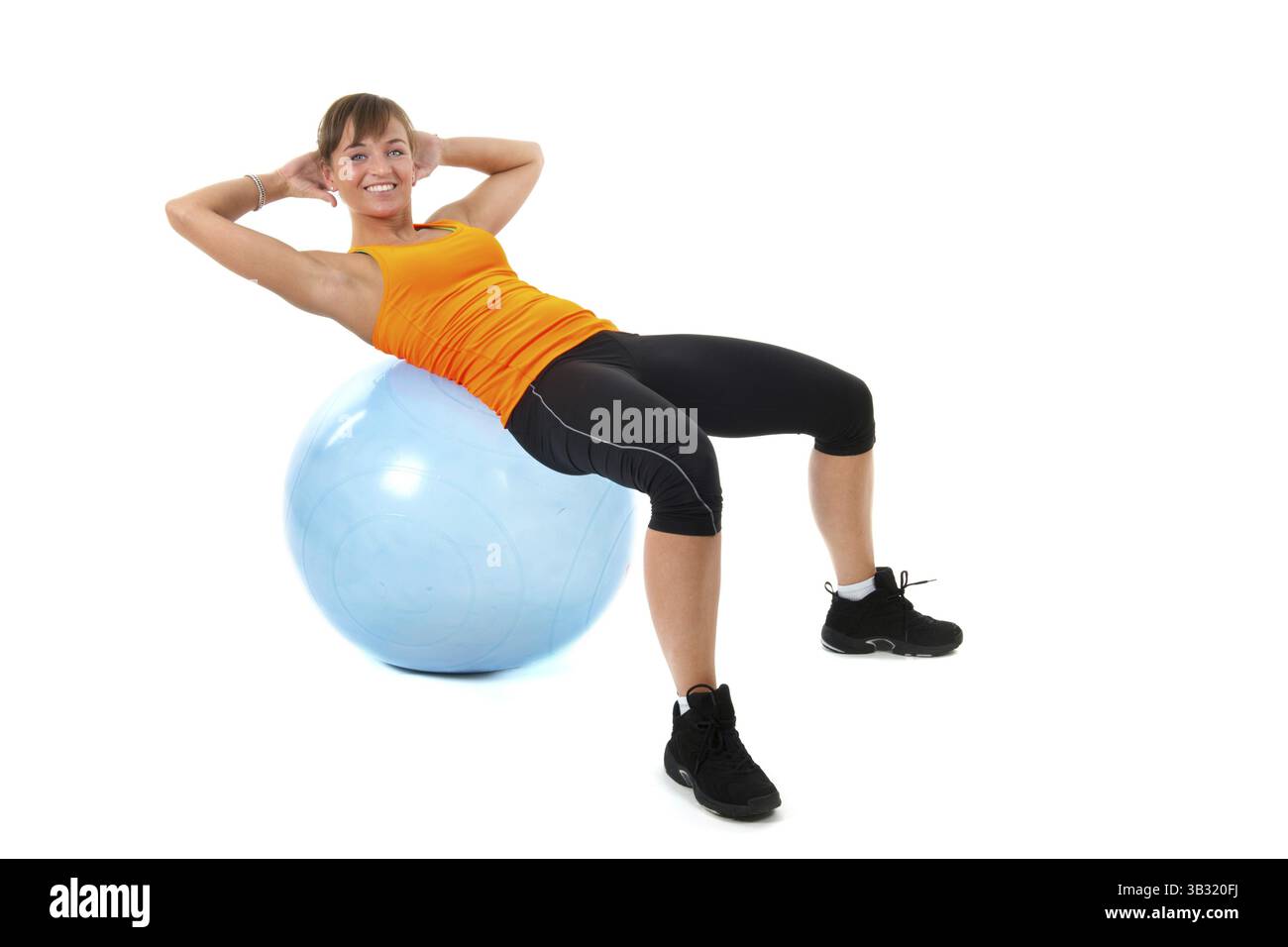 Sport Mädchen mit blauen Gymnastik ball Stockfoto