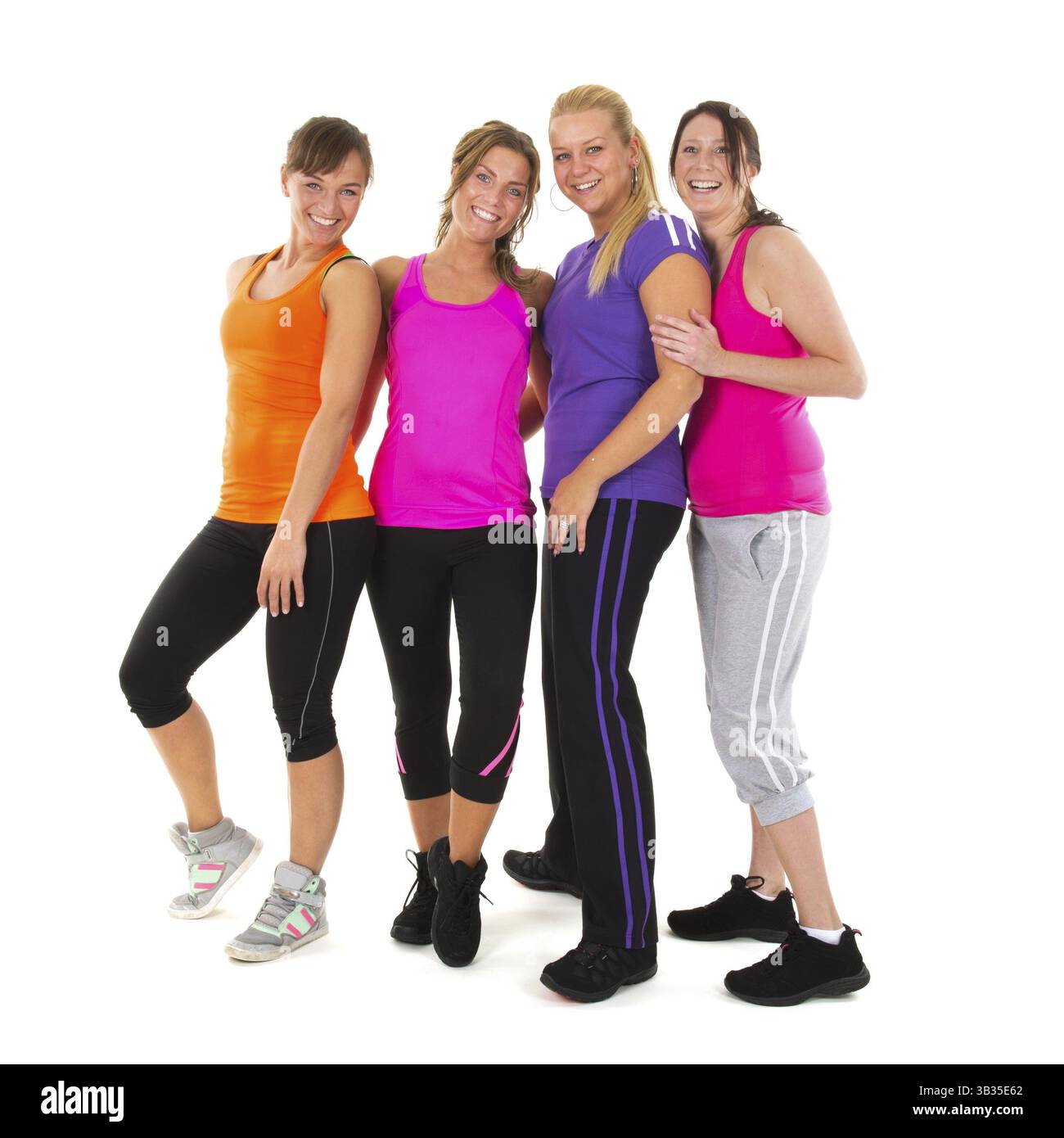 Gruppe Mädchen in bunten Sportbekleidung isoliert auf weißem Hintergrund Stockfoto