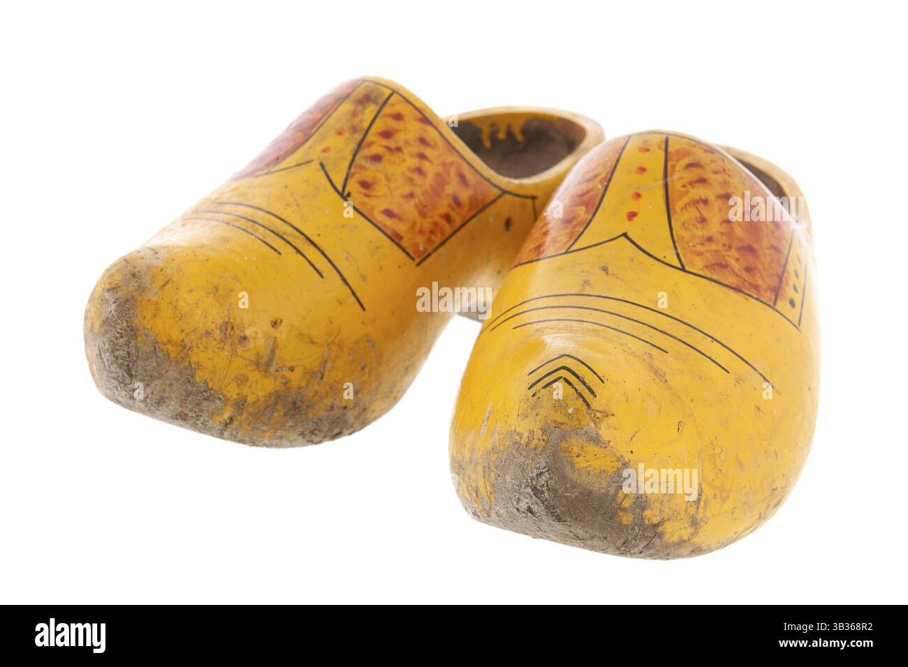 Alte holländische Holzschuhe isoliert auf weißem Hintergrund Stockfoto