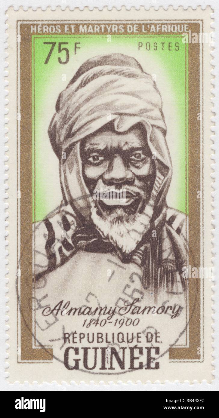 GUINEA - 2. Oktober 1962: 75 Franken Gelb-Grün, Sepia und Gold Briefmarke mit Porträt von Almamy Samory (Samory Toure, Samory Touré oder Almamy Samore Lafiya Toure), Serie Heroes and Martyrs of Africa. Er war ein muslimischer Geistlicher, ein Militärstratege und Gründer und Führer des Wassoulou-Reiches, eines islamischen Reiches im heutigen Nord- und Südostguinea. Toure widersetzte sich der französischen Kolonialherrschaft in Westafrika von 1882 bis zu seiner Gefangennahme im Jahr 1898. Samori Toure war der Urgroßvater von Guineas erstem Präsidenten Ahmed Sékou Touré Stockfoto