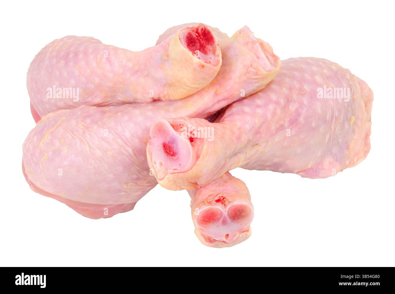 Gruppe von frisch zubereiteter Haut auf Hähnchenkeulen isoliert auf weißem Hintergrund Stockfoto