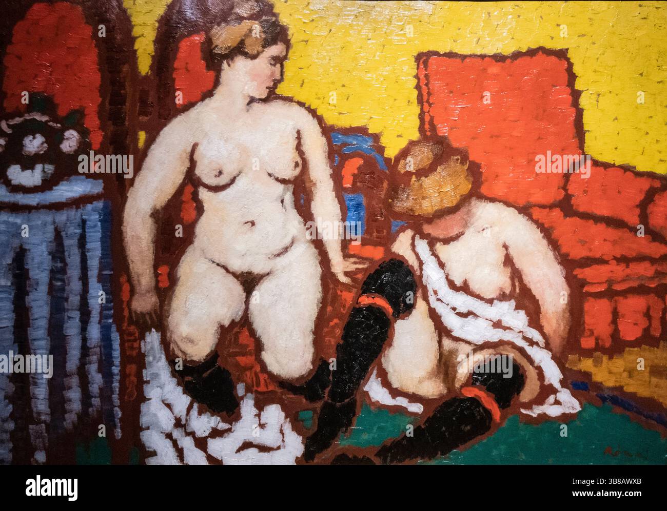 Jozsef Rippl-Ronai: „Mädchen, die sich anziehen (rote Möbel und gelbe Wand)“ (1912-13) Stockfoto
