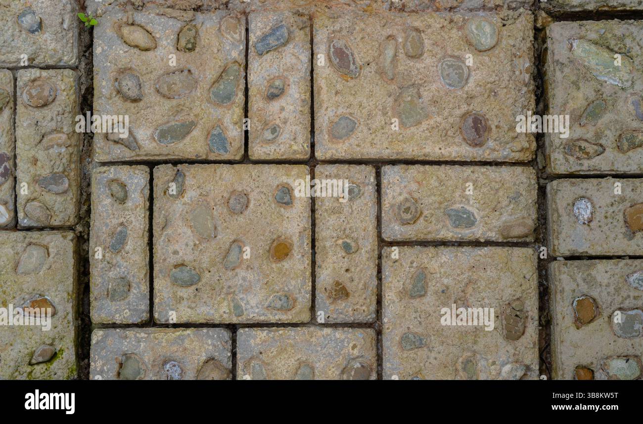 Textur einer Steinmauer. Alte Burg Stein Wand Textur Hintergrund. Stein Wand als Hintergrund oder Textur. Teil einer Mauer aus Stein, für den Hintergrund oder Text Stockfoto