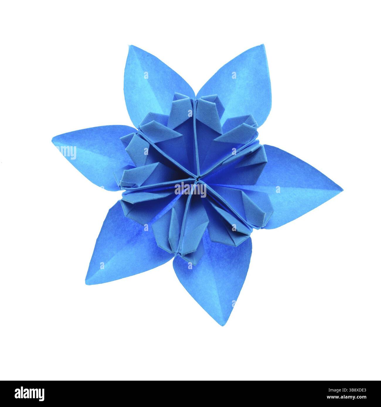 Blaue Schneeflocke der Origami-Einheit isoliert auf weißem Hintergrund Stockfoto