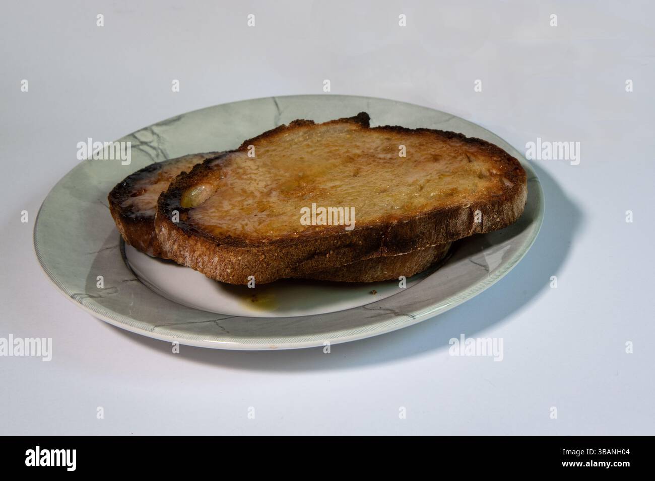Warmen Buttertoast Stockfoto