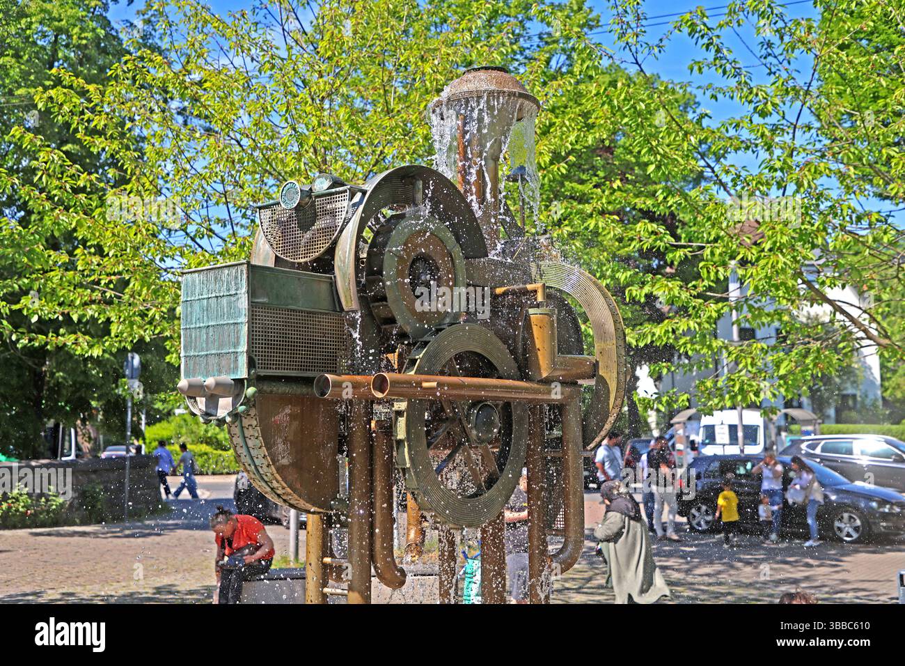 Wasserspiele zur Dekoration Wasserspiele in Form einer Lokomotive nahe dem Eisenbahnmuseum Bochum Dahlhausen zur Erfrischung und Dekoration auf öffentlichen Plätzen. Bochum Nordrhein-Westfalen Deutschland Dahlhausen *** Wasserspiele zur Dekoration Wasserspiele in Form einer Lokomotive in der Nähe des Eisenbahnmuseums Bochum Dahlhausen zur Erfrischung und Dekoration an öffentlichen Plätzen Bochum Nordrhein-Westfalen Deutschland Dahlhausen Stockfoto