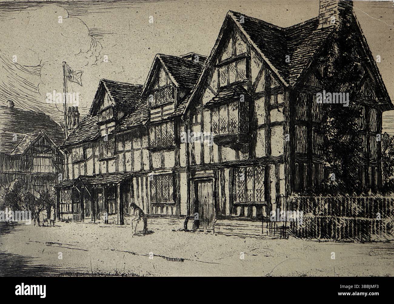 Eine bezaubernde Reihe von Gebäuden im Tudor-Stil mit klassischem Fachwerk, steil geneigten Schindeldächern und sichtbaren Holzbalken. Auf einem der Gebäude befindet sich ein Kamin, eine Fahne winkt von einem befestigten Pfosten und ein paar Leute schlendern entlang der Straße vor den Gebäuden. Auf der rechten Seite ist ein Zaun, der die Tiefe der Szene erhöht. Aus einem viktorianischen und edwardianischen Scrapbook, das scheinbar von einer unbenannten Person zusammengestellt wurde. Stockfoto