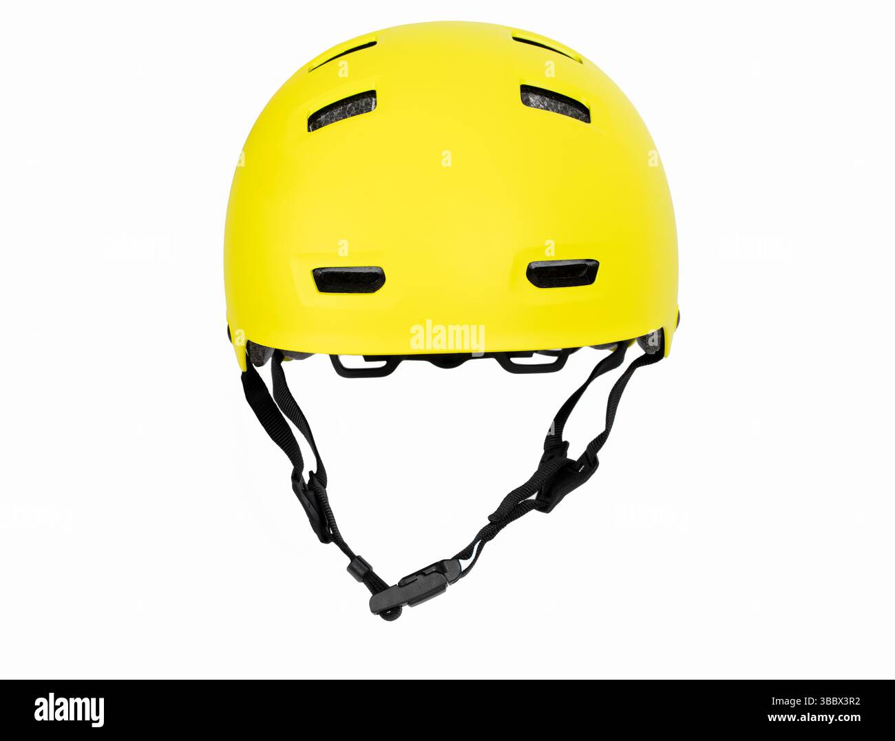 Gelber Helm in Frontposition auf weißem Hintergrund Stockfoto