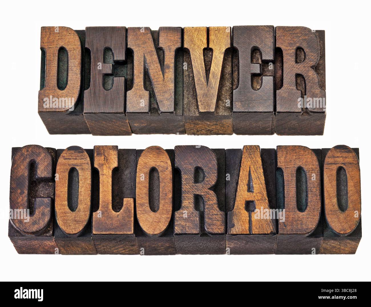 Denver und Colorado - isoliertes Wort in rustikalem Buchdruckholz - französische Clarendon-Schriftart beliebt in westlichen Filmen und Erinnerungsstücken Stockfoto